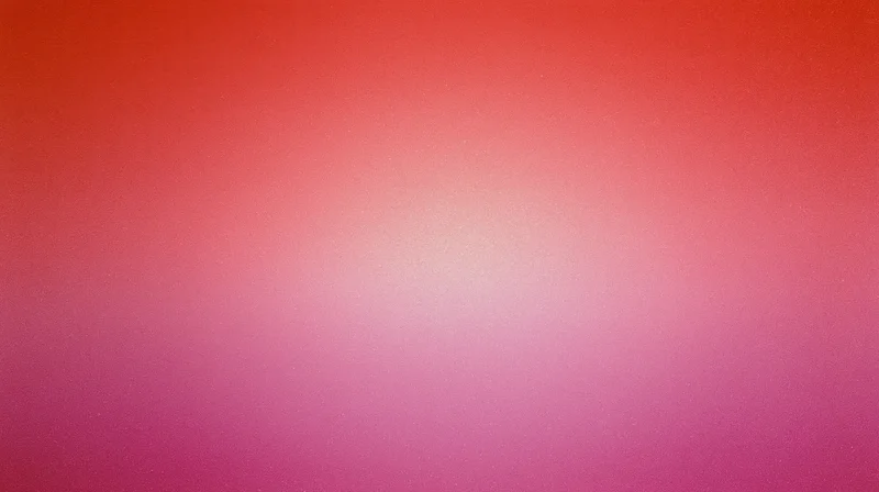 A smooth color gradient transitioning from red to pink and magenta with a soft glow at the center