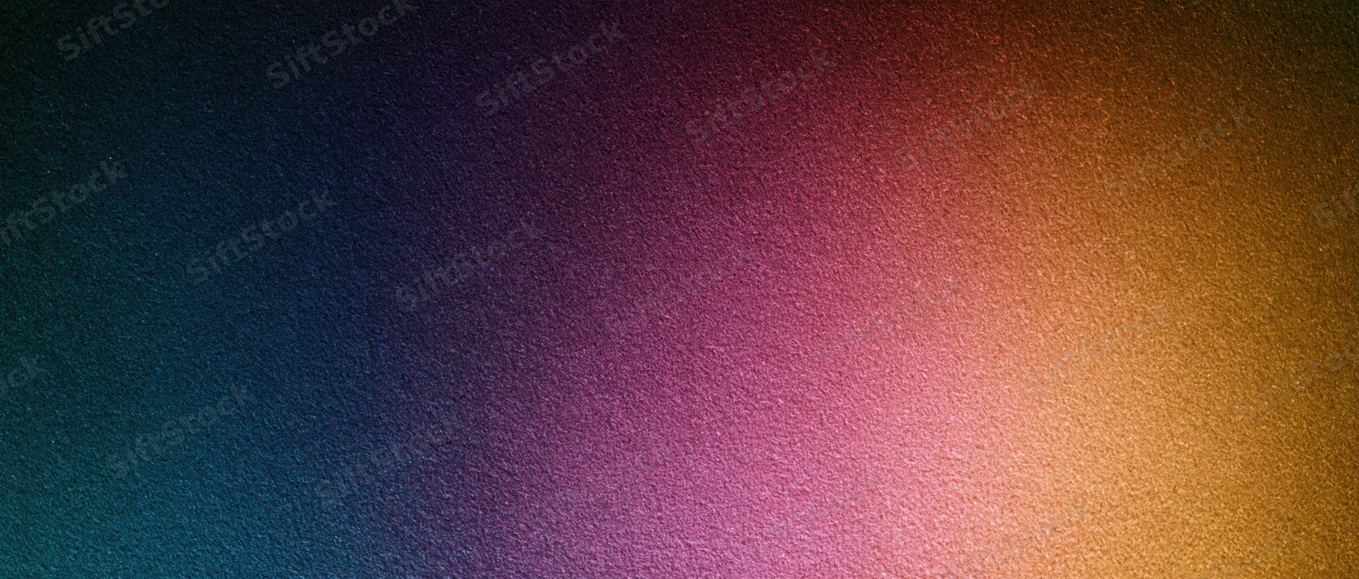 A smooth color gradient transitioning from dark blue to warm orange across a textured digital background