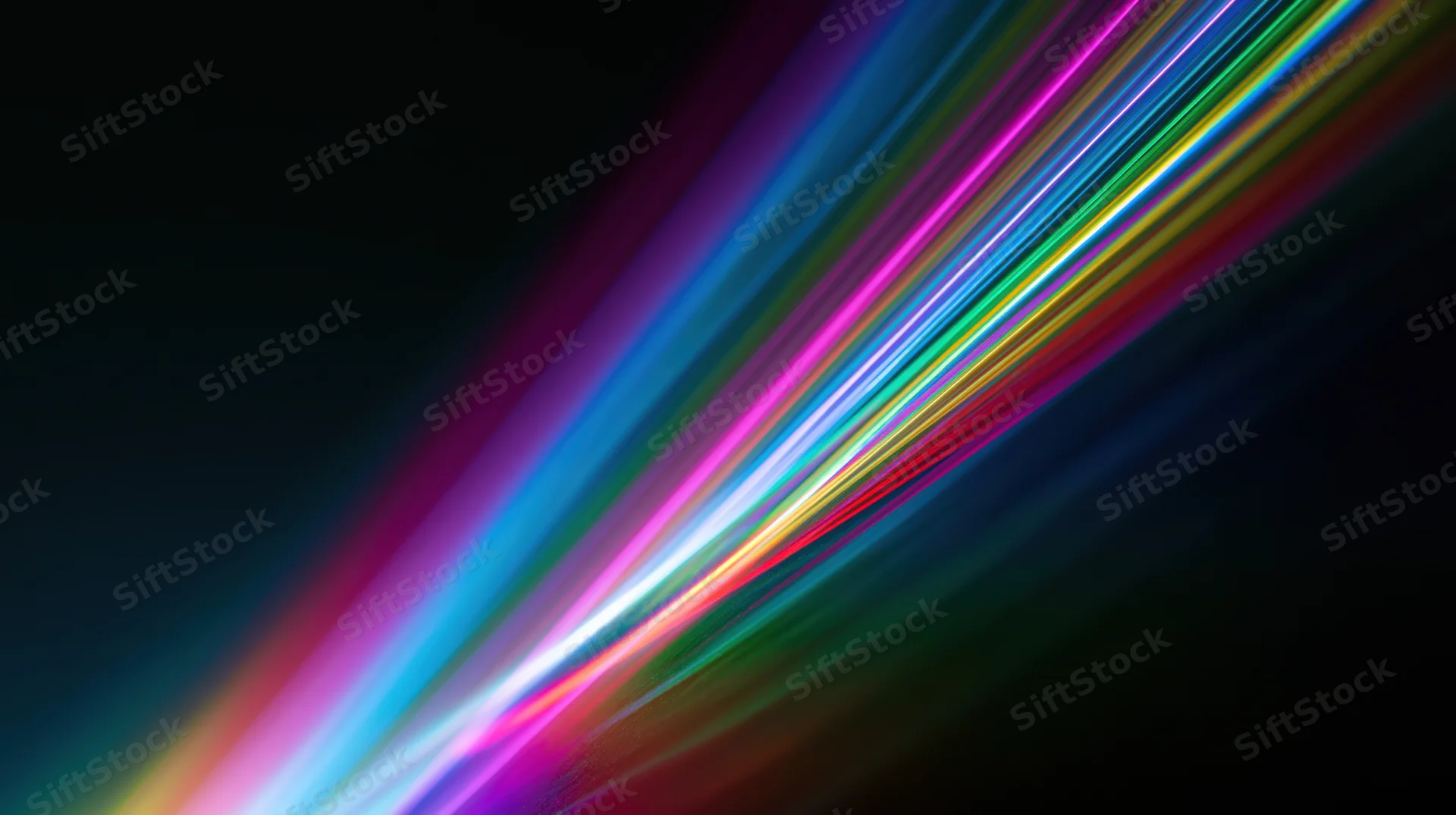 Colorful light streaks moving diagonally across a dark background