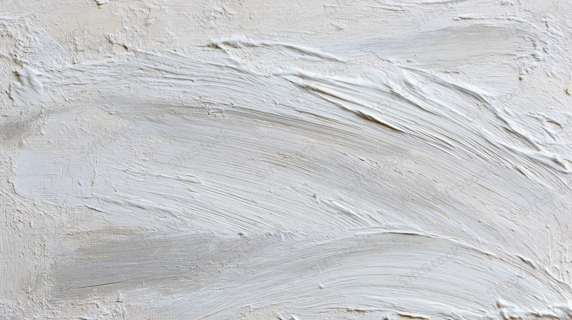 White paint applied in broad brushstrokes across canvas surface