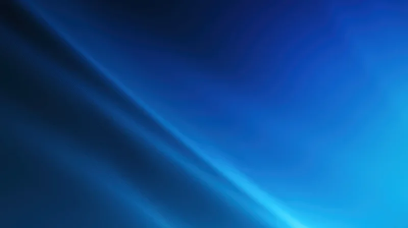 Abstract blue gradient background with flowing light streaks and smooth texture