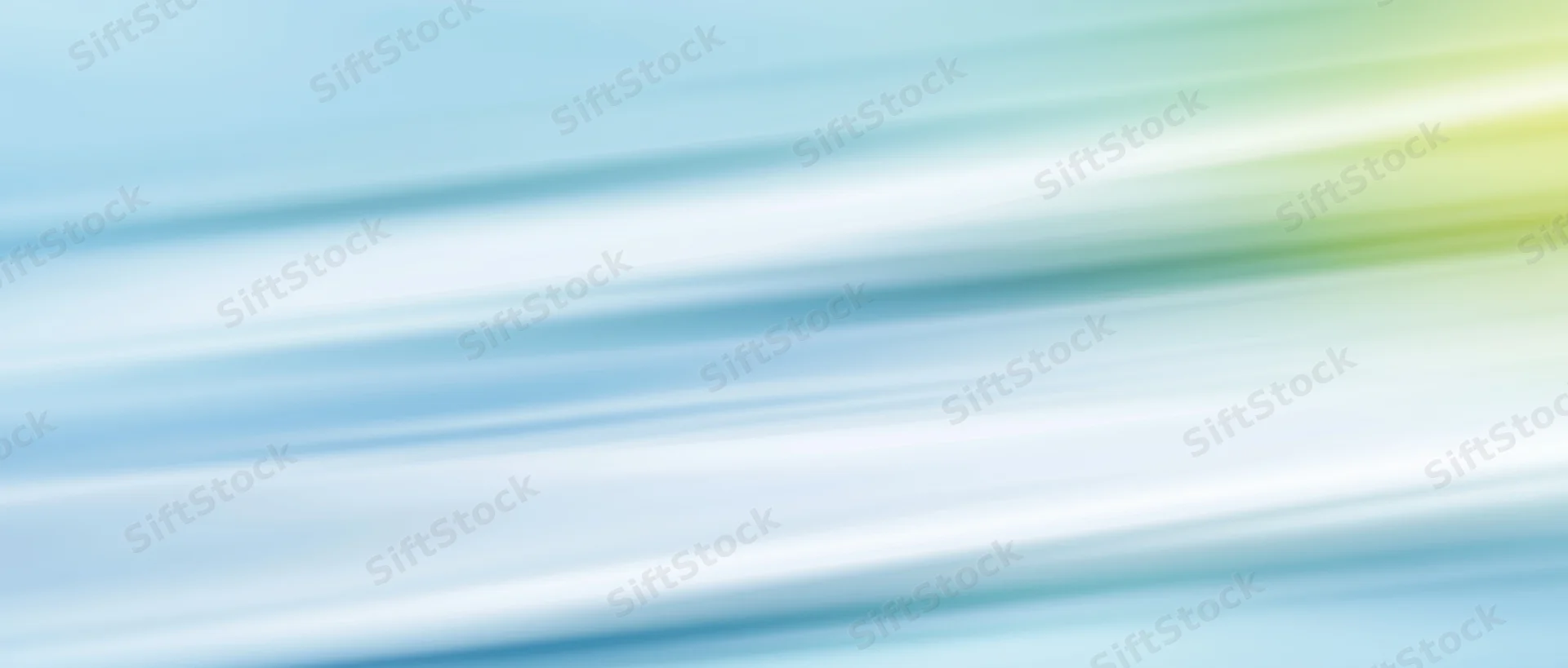 Abstract gradient background with flowing diagonal light streaks in blue green and yellow hues