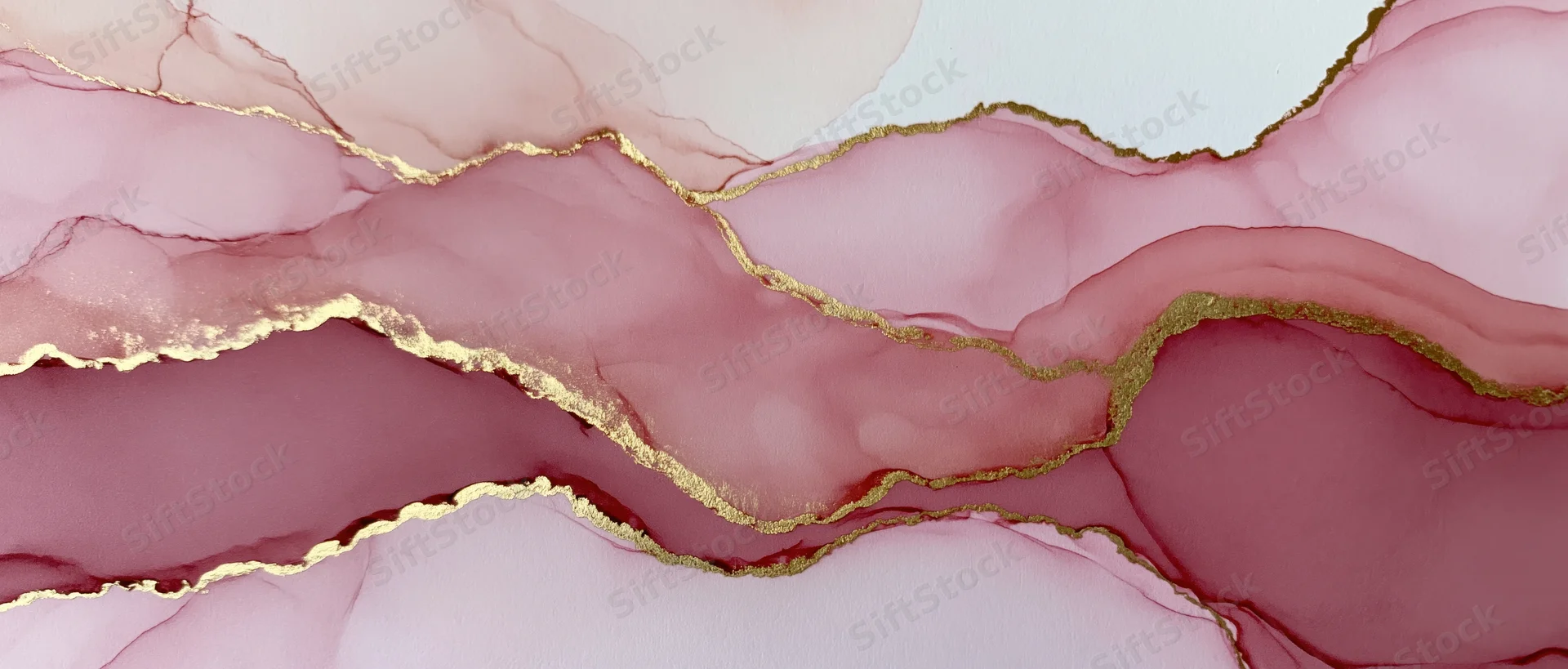 Abstract fluid paint with gold accents flowing in pink and burgundy hues across a smooth surface