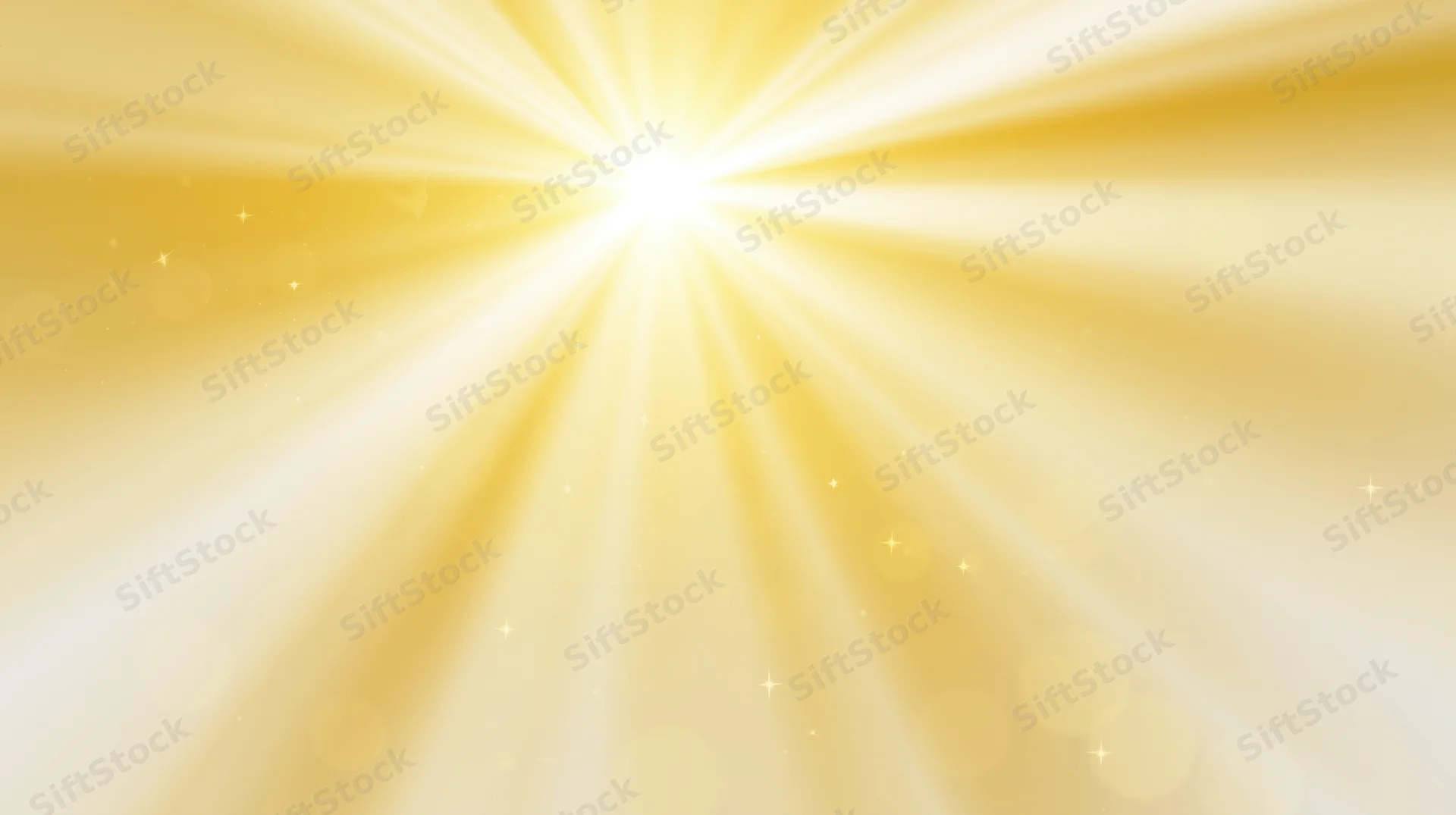 Radiant golden light bursting from center with soft glow and sparkling particles