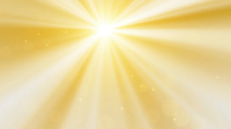 Radiant golden light bursting from center with soft glow and sparkling particles