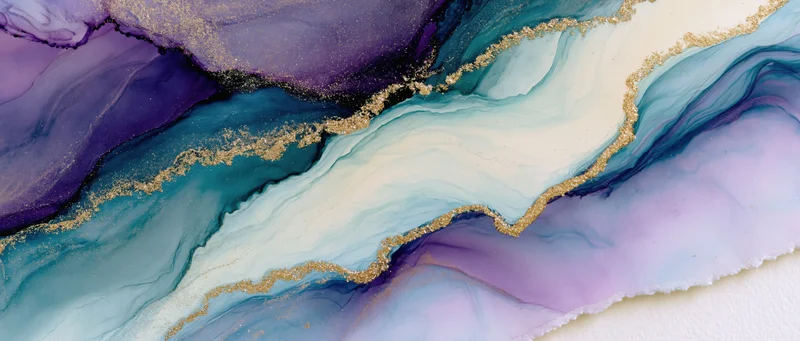 Fluid paint swirls in purple blue and white with gold glitter accents forming an abstract marbled surface