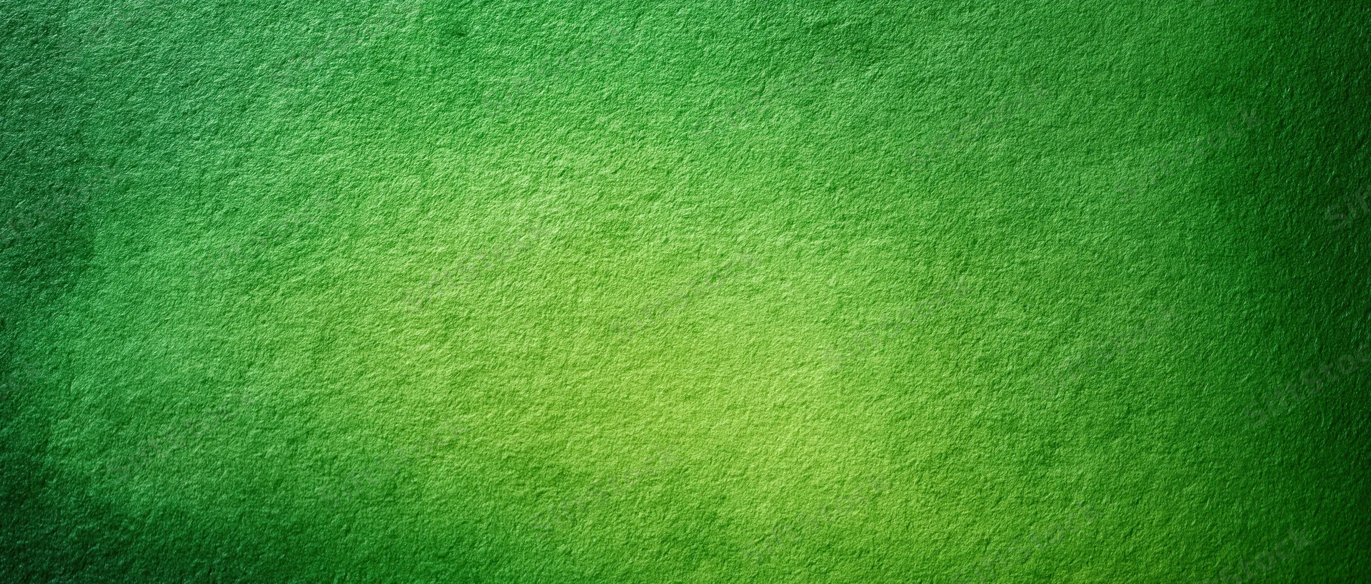 A textured green gradient background with soft watercolor-like variation across the surface