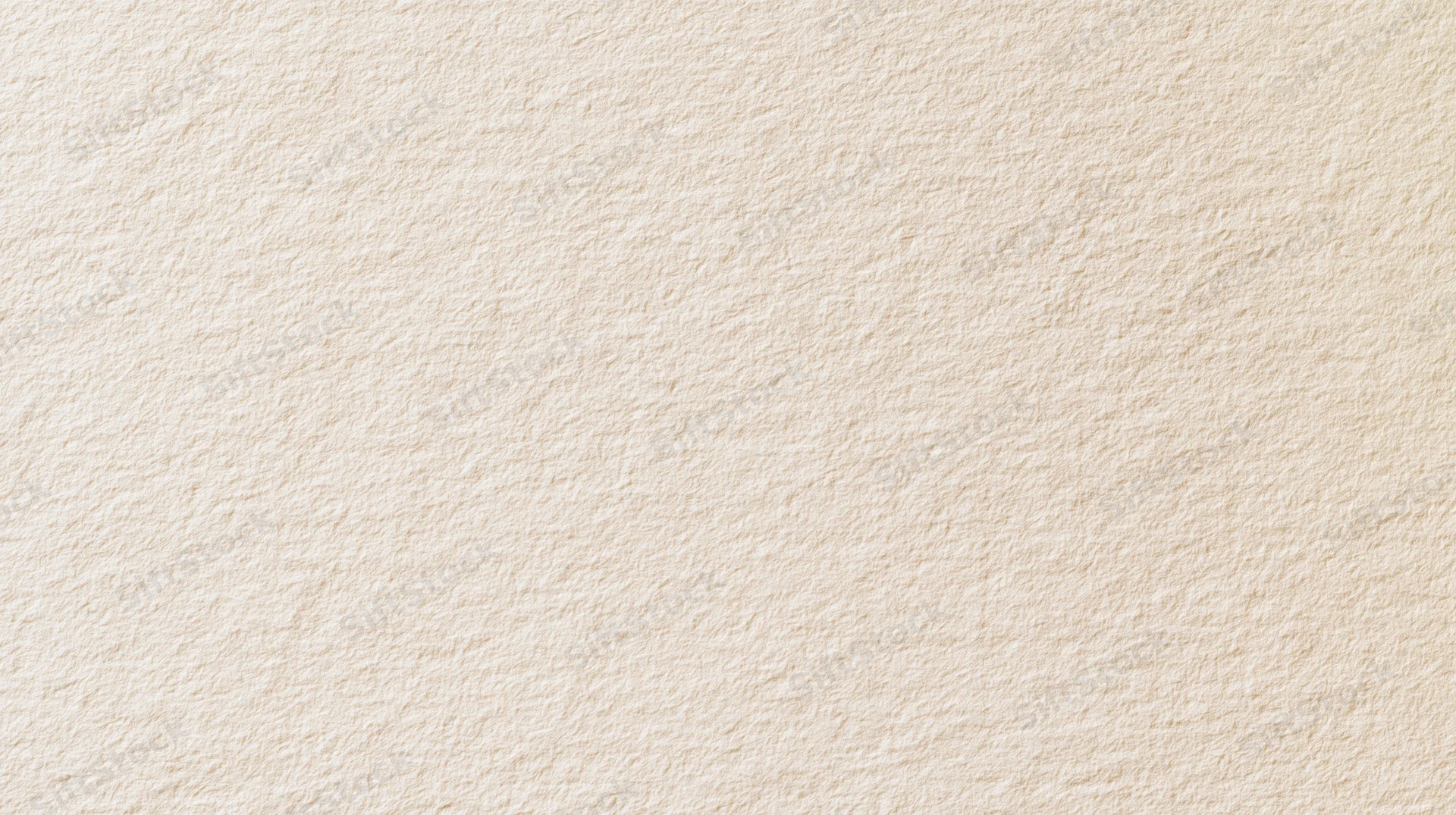 Beige textured paper surface as a neutral background with subtle grain and even tone