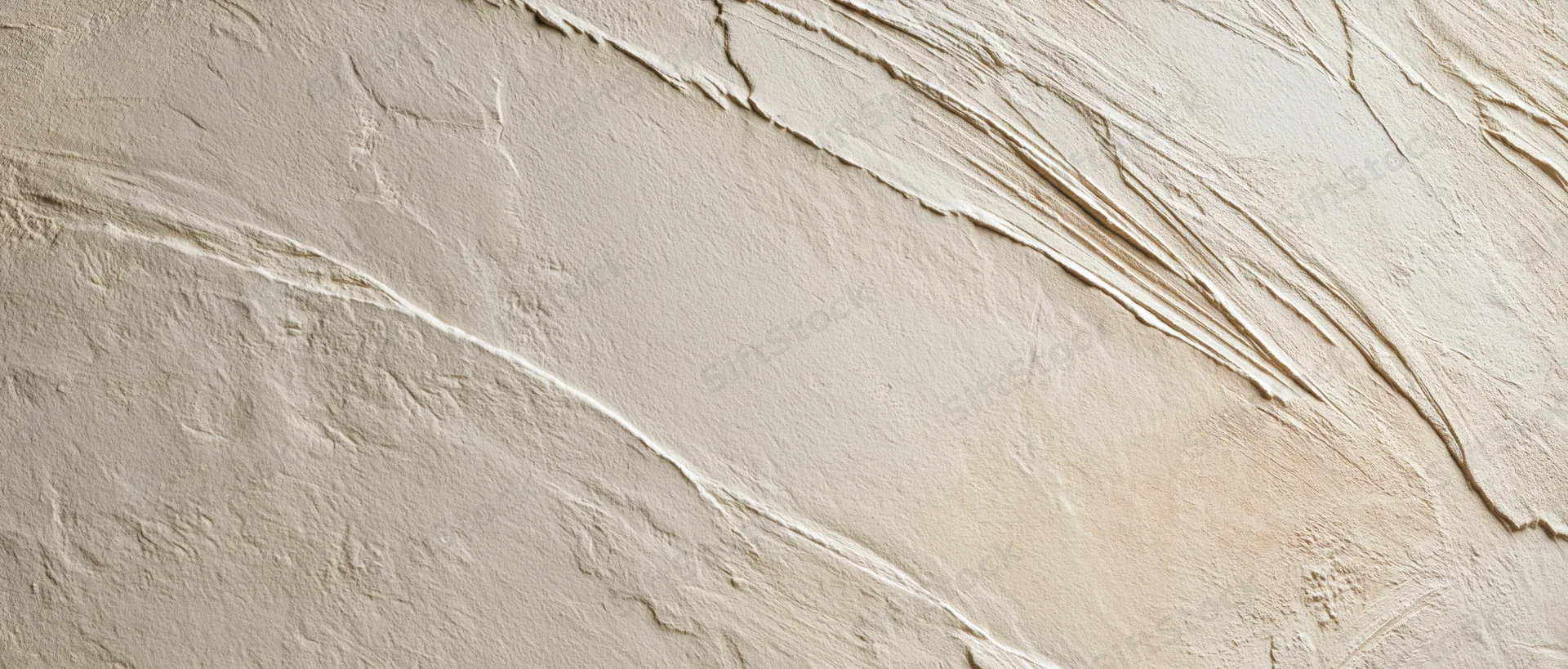 Textured plaster wall with diagonal brushstrokes and uneven surface finish