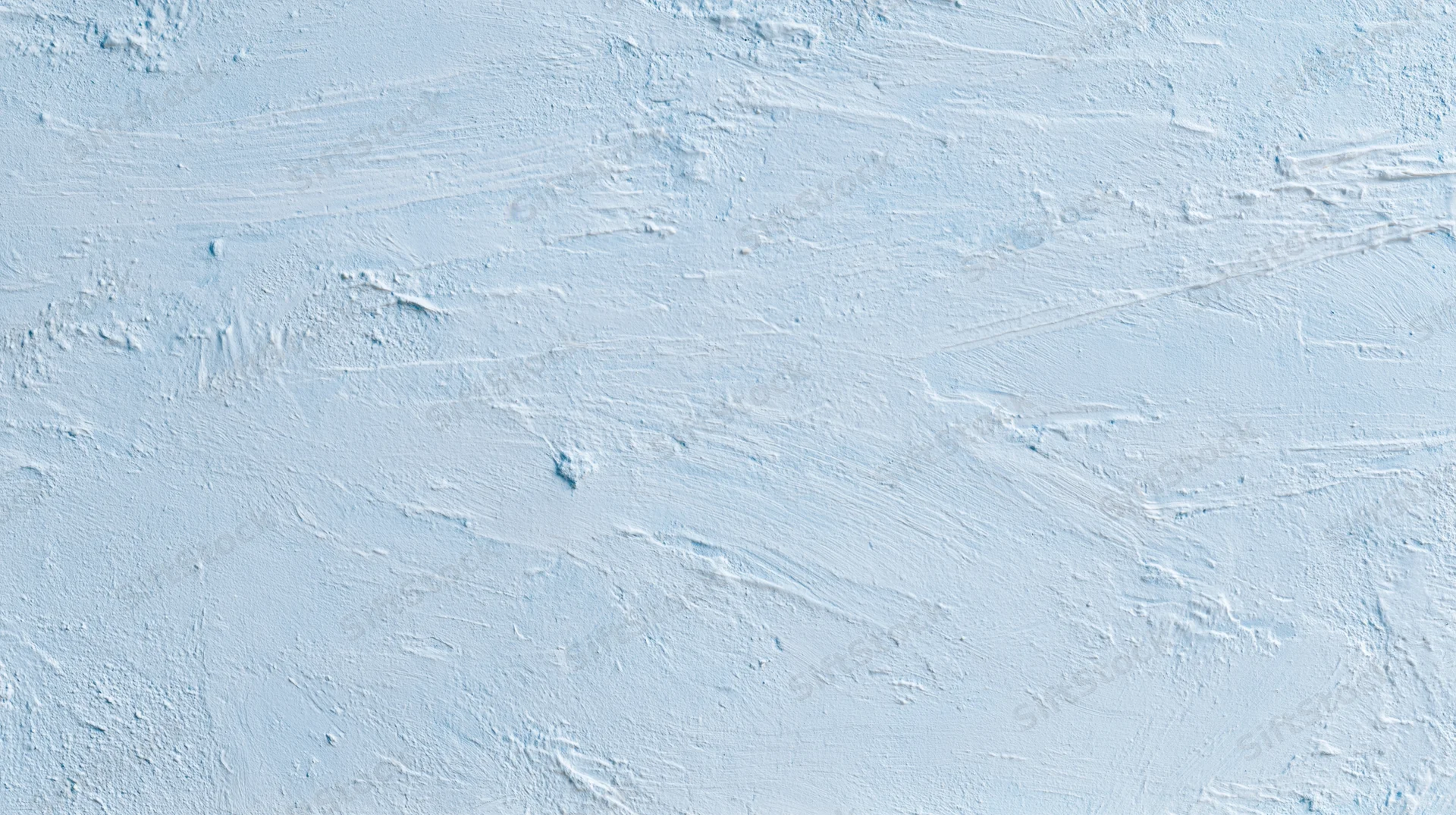 Close-up of a smooth white painted wall with visible brushstrokes and subtle texture, used as a background