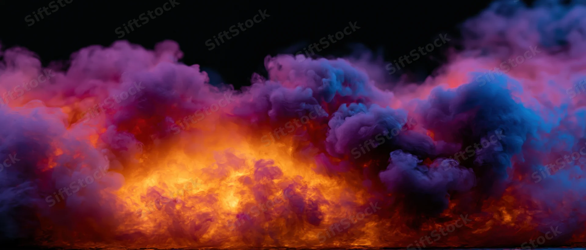 Swirling colorful smoke clouds glowing with orange light against dark background