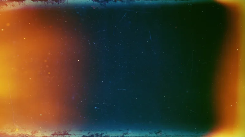Abstract gradient background with vintage film texture and color transition from orange to blue