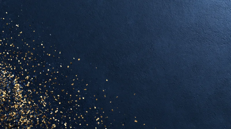 Gold glitter scattered across navy textured surface with copyspace on right