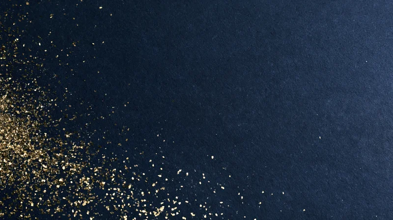 Gold glitter scattered diagonally across navy textured background with copyspace