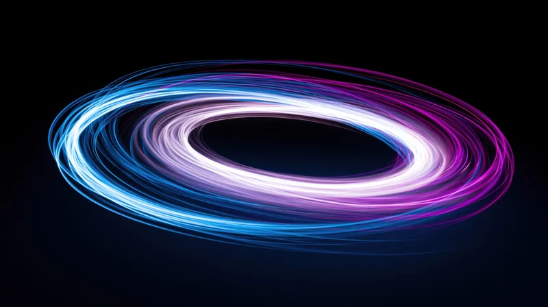 Glowing neon light rings spiraling in motion against dark background
