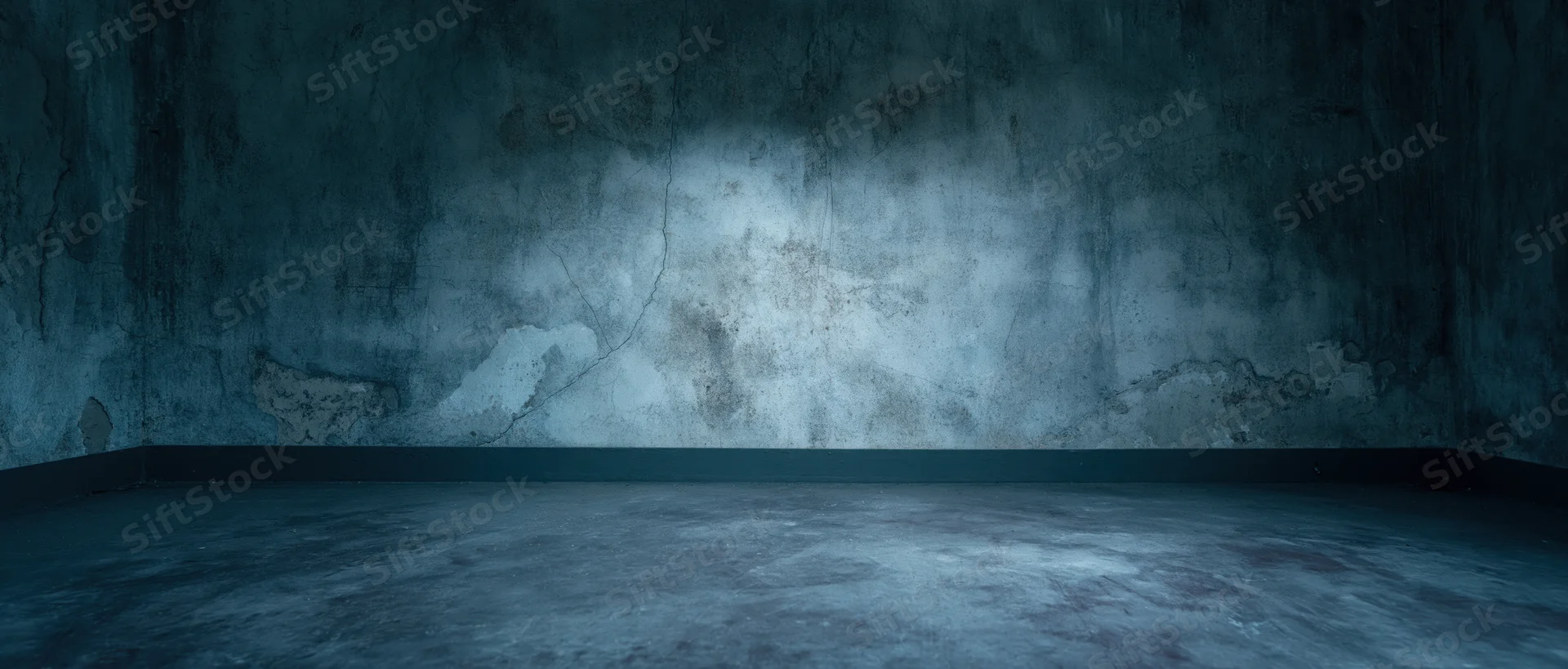 Empty industrial concrete room with cracked walls and dim blue lighting