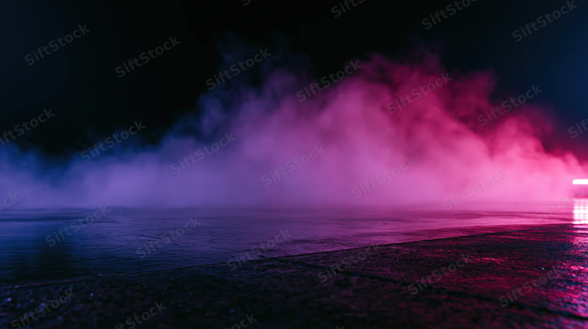 Neon-lit smoke billowing over wet pavement at night