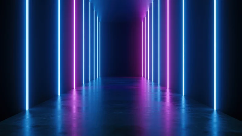 Neon-lit tunnel with vertical blue and pink light strips reflecting on a dark floor