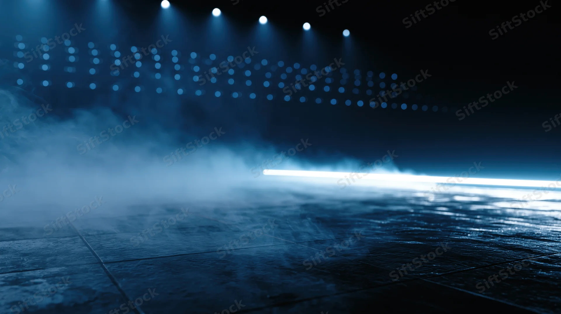 Empty stage with blue spotlights and smoke, floor reflecting light, performance venue ambiance
