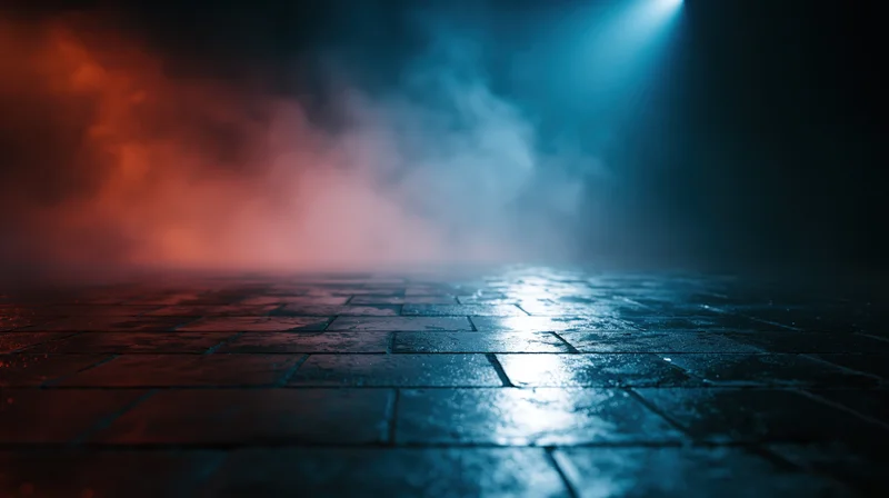 Wet tiled floor under blue and red spotlights with smoke in a dark stage setting