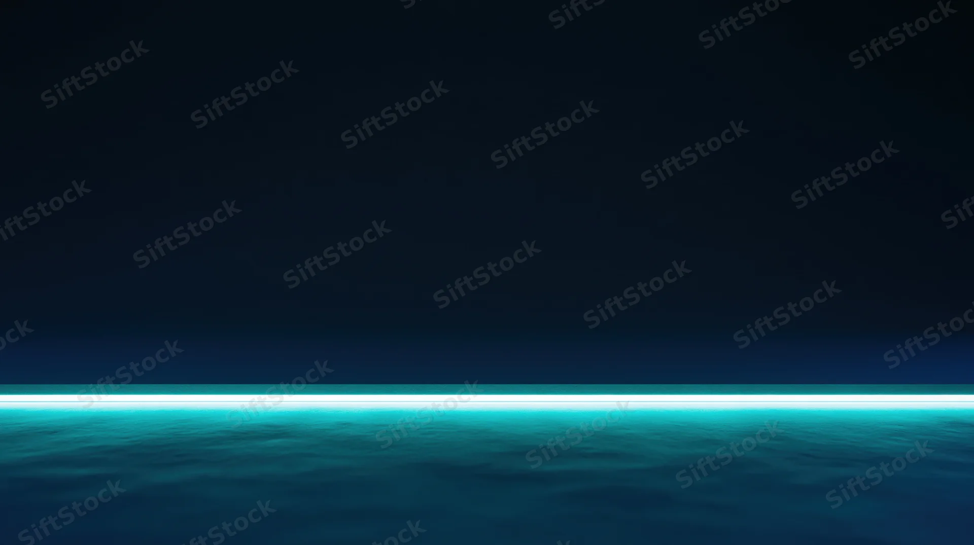 Glowing teal horizon over calm ocean at night