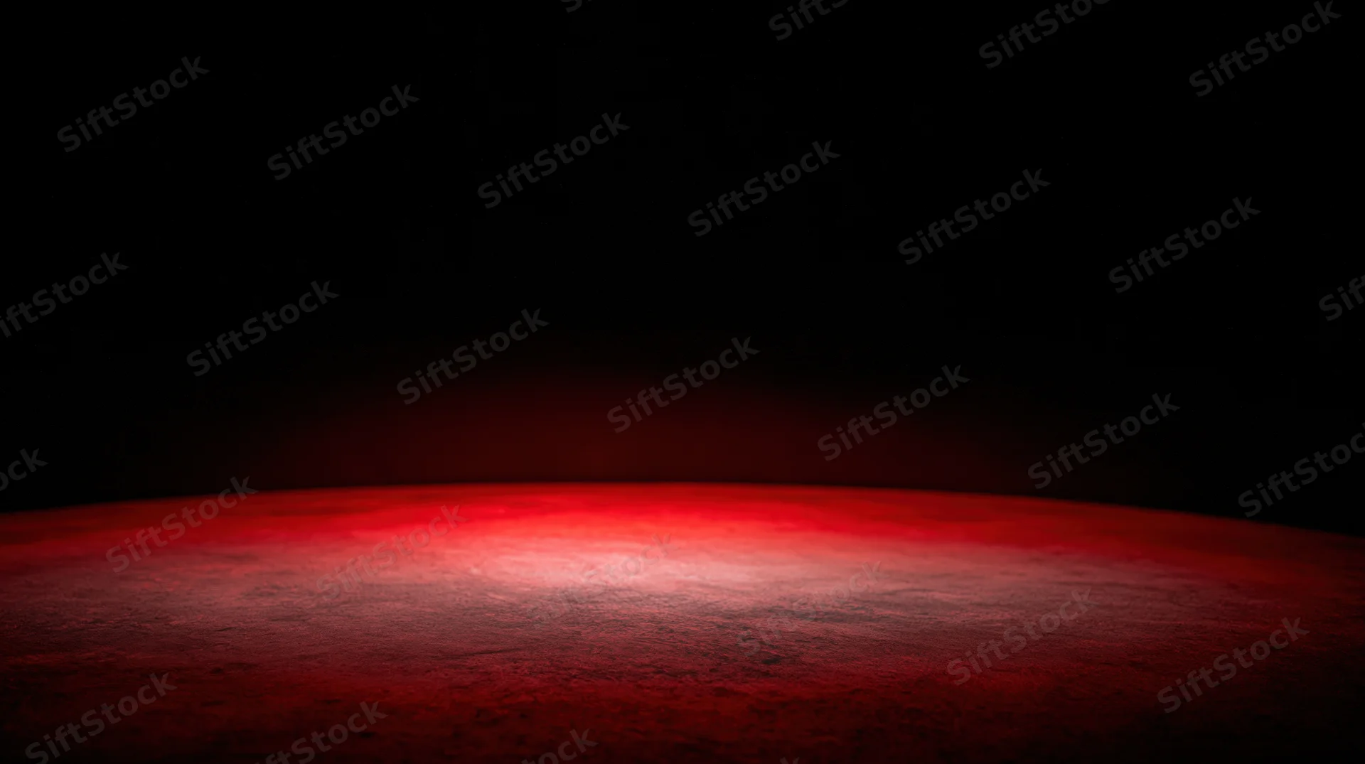 Curved red surface glowing at the horizon against a dark background