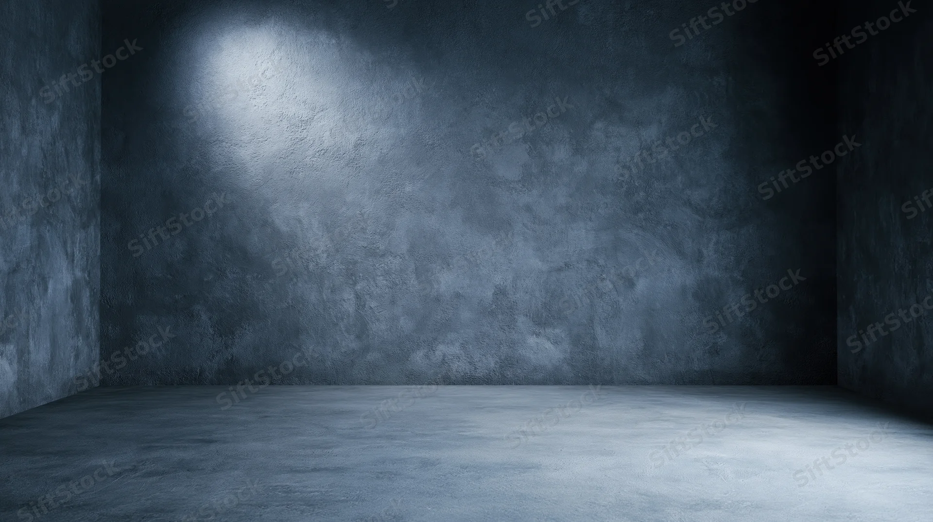 Empty concrete room with spotlight on textured wall and floor