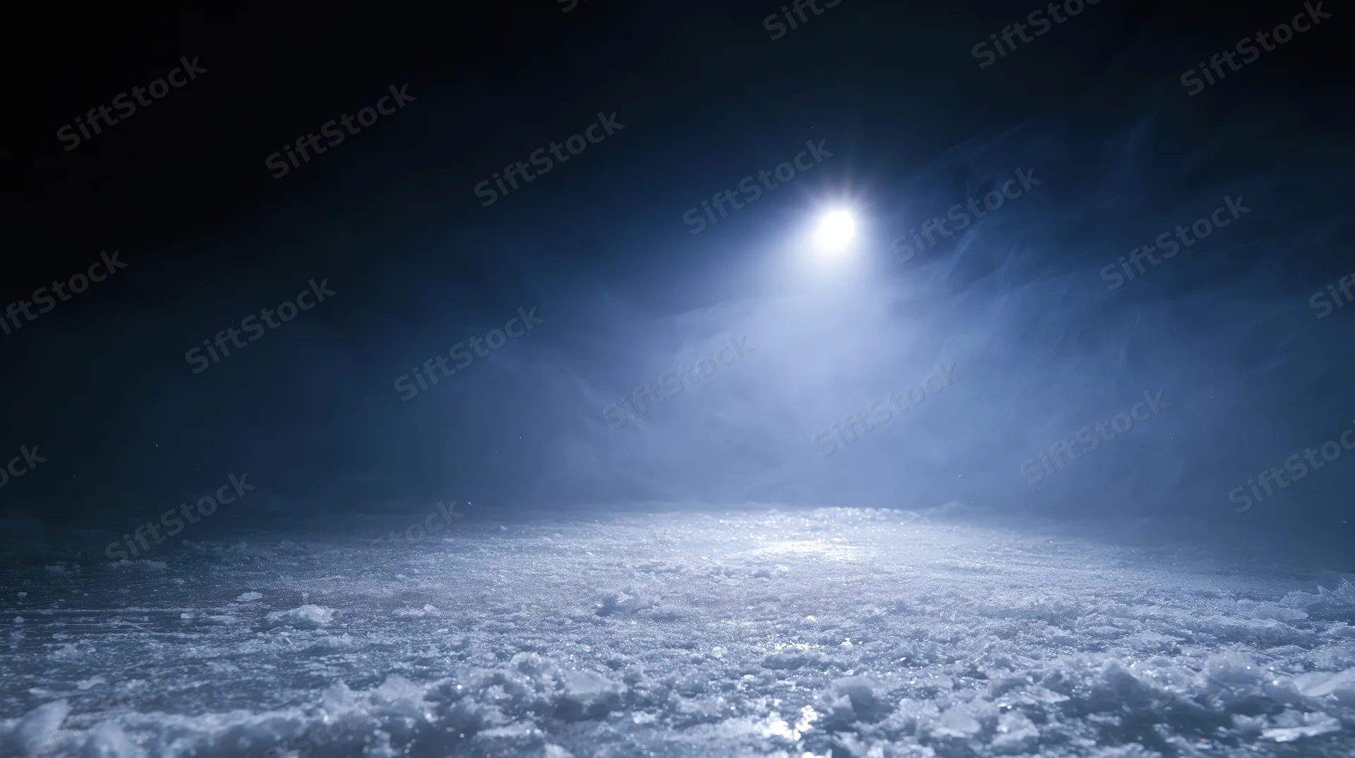 Moonlight reflecting on a frozen icy surface at night
