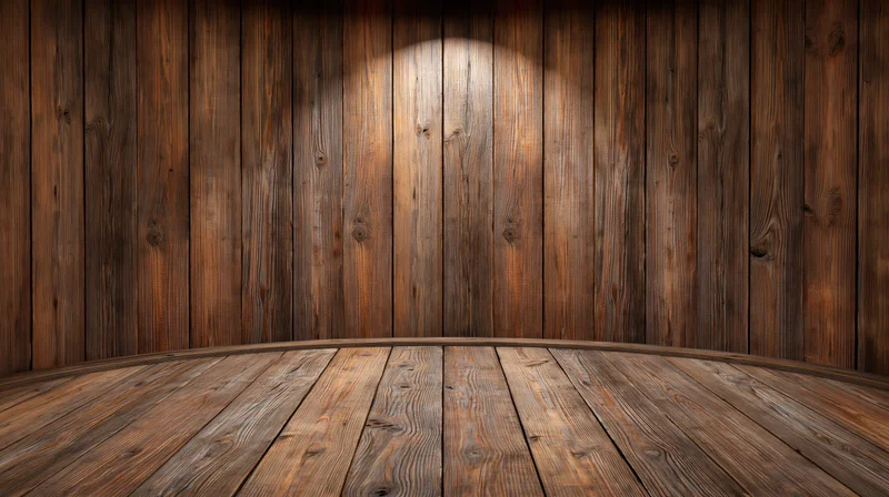 Curved wooden floor and wall with spotlight in empty interior space