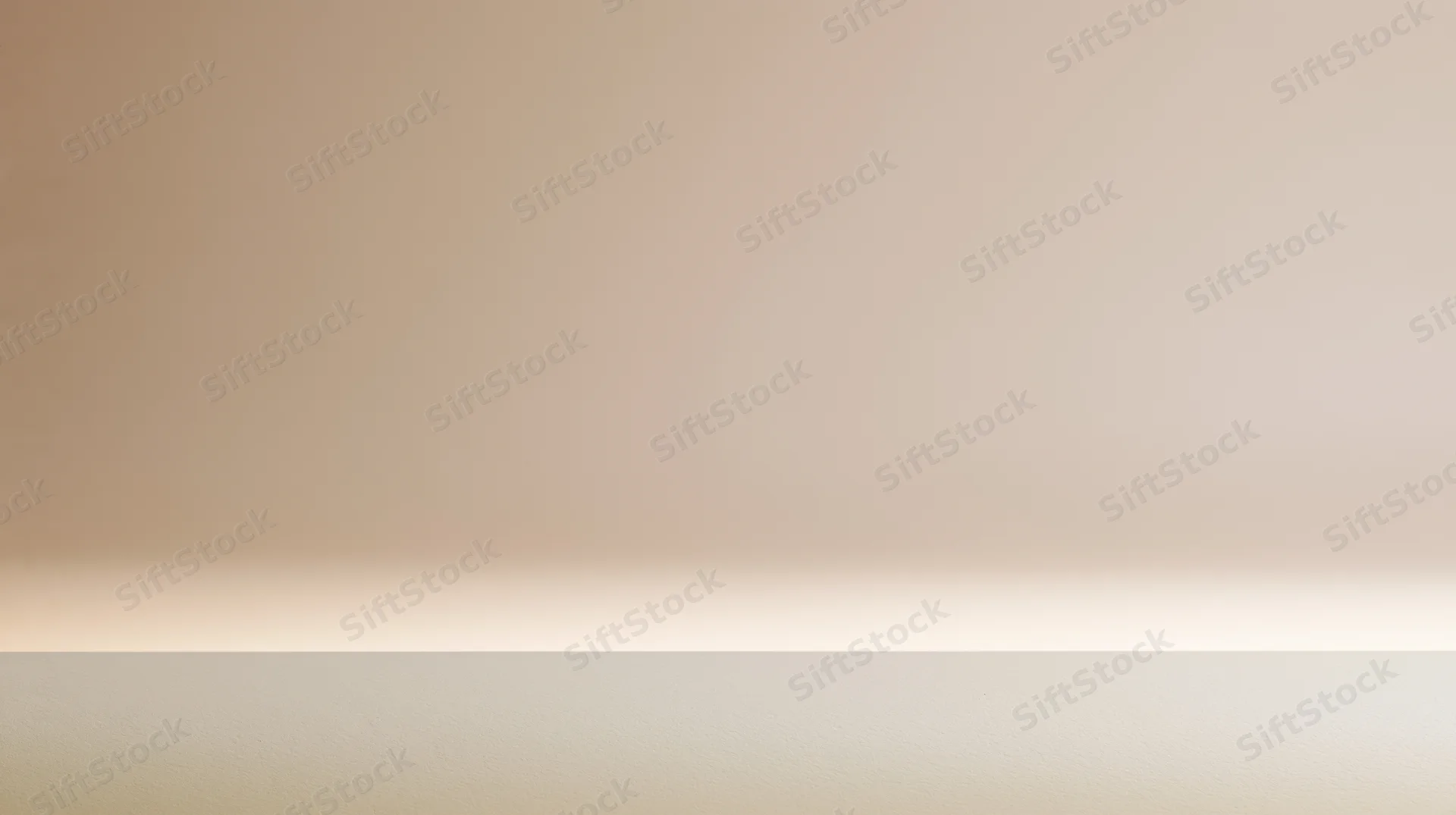 Smooth beige gradient background with soft light and copyspace for design placement