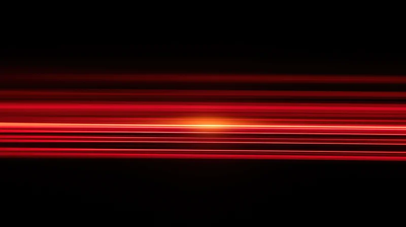 Horizontal red light streaks moving across a black background with glowing center