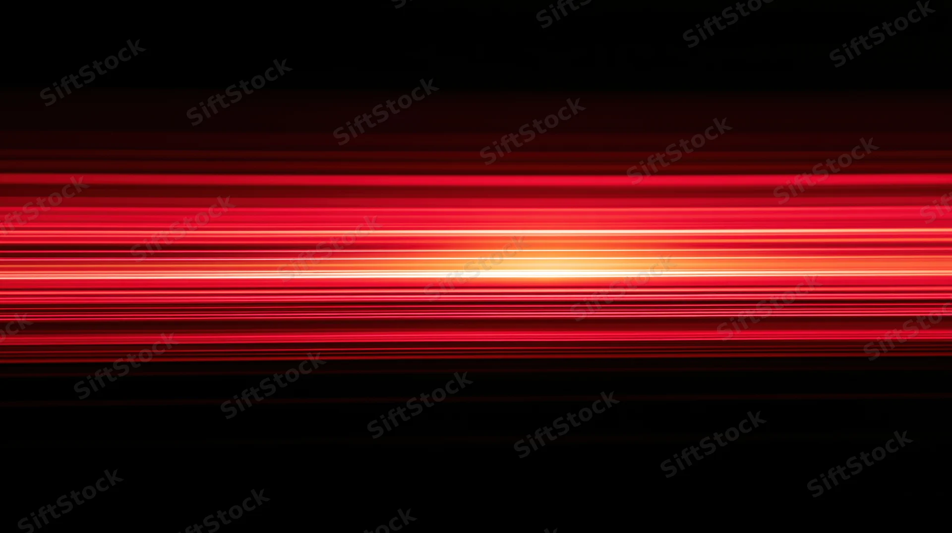 Horizontal red light streaks glowing against a black background with motion blur effect