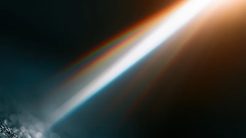 Bright light flare with colorful bokeh and soft gradient background