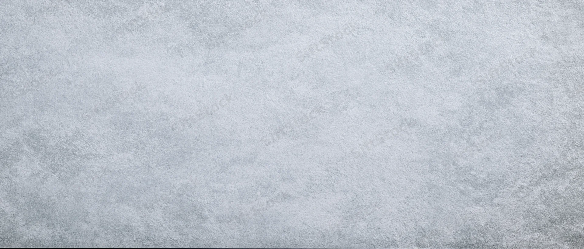 Textured gray concrete surface filling the frame as a seamless background