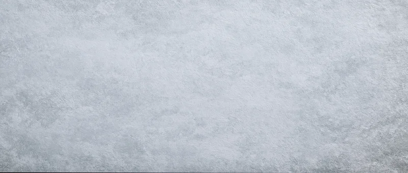 Textured gray concrete surface filling the frame as a seamless background