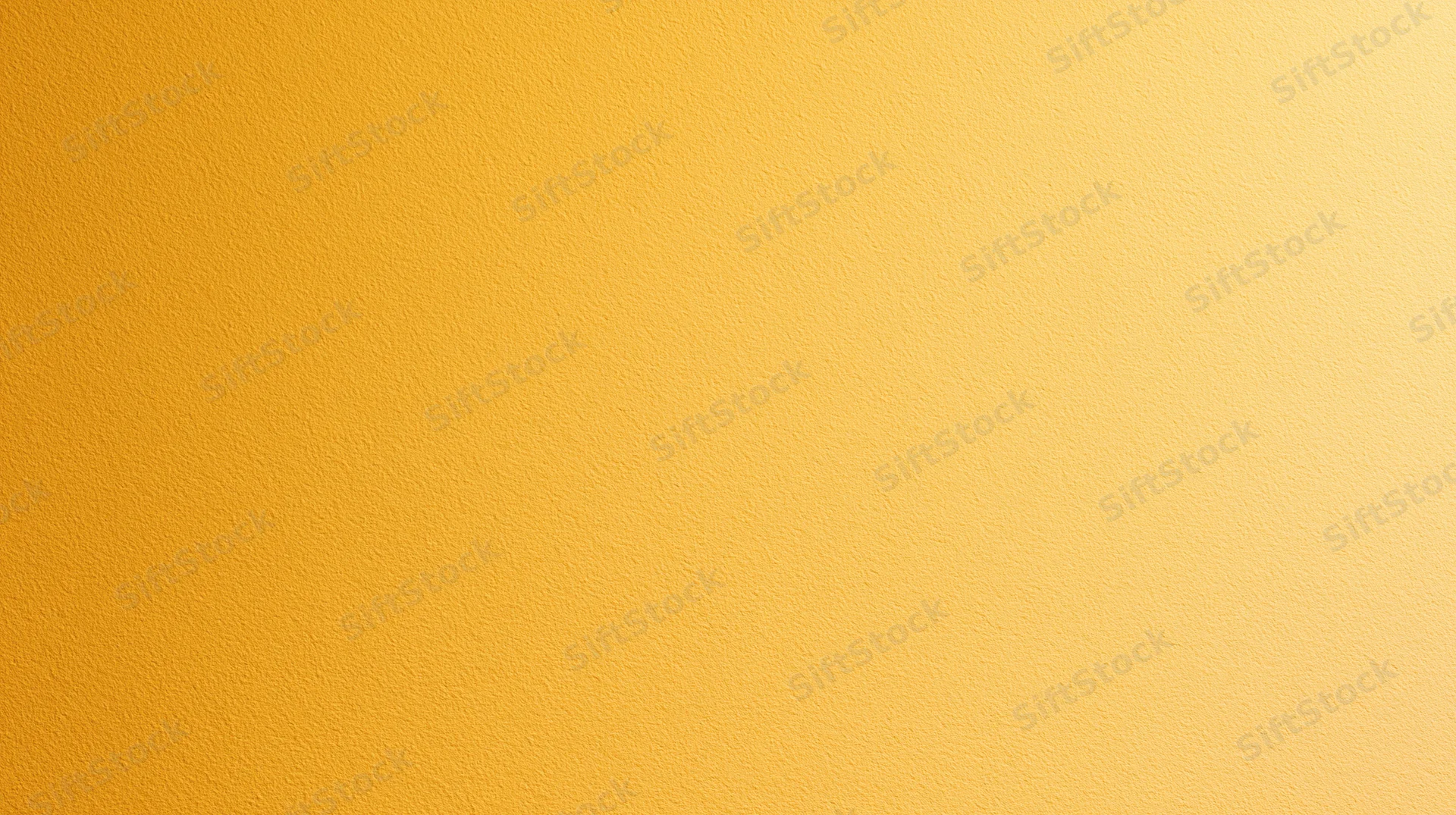 A smooth yellow gradient background with subtle texture and even lighting