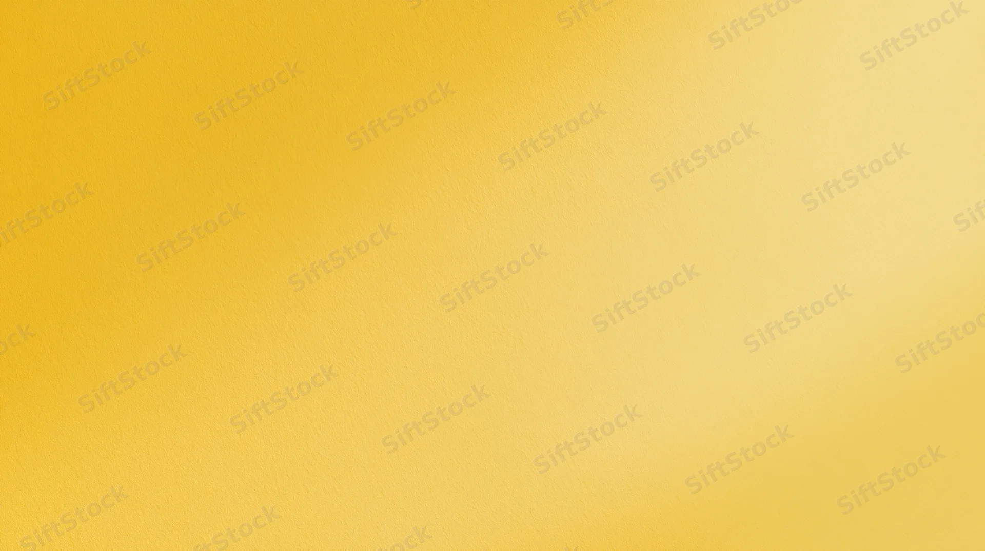 A smooth yellow gradient background with subtle texture filling the frame