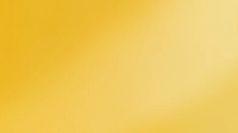 A smooth yellow gradient background with subtle texture filling the frame