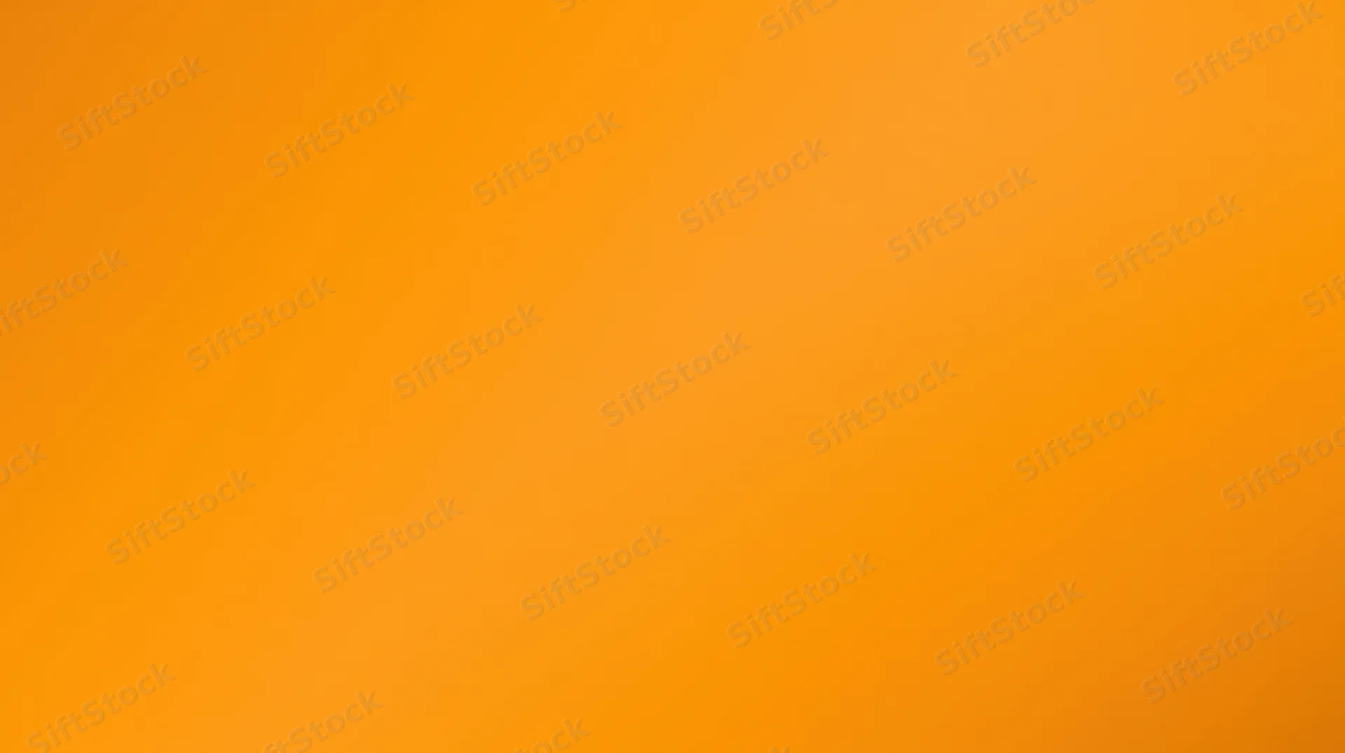 Orange gradient background with smooth color transition and copyspace for text or design overlay