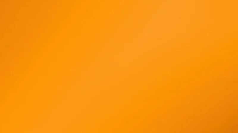 Orange gradient background with smooth color transition and copyspace for text or design overlay