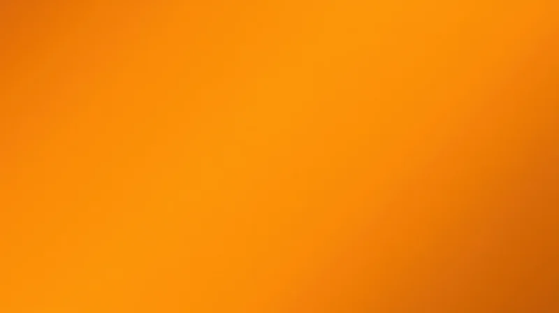 Orange gradient background with smooth color transition and copyspace for text or design overlay