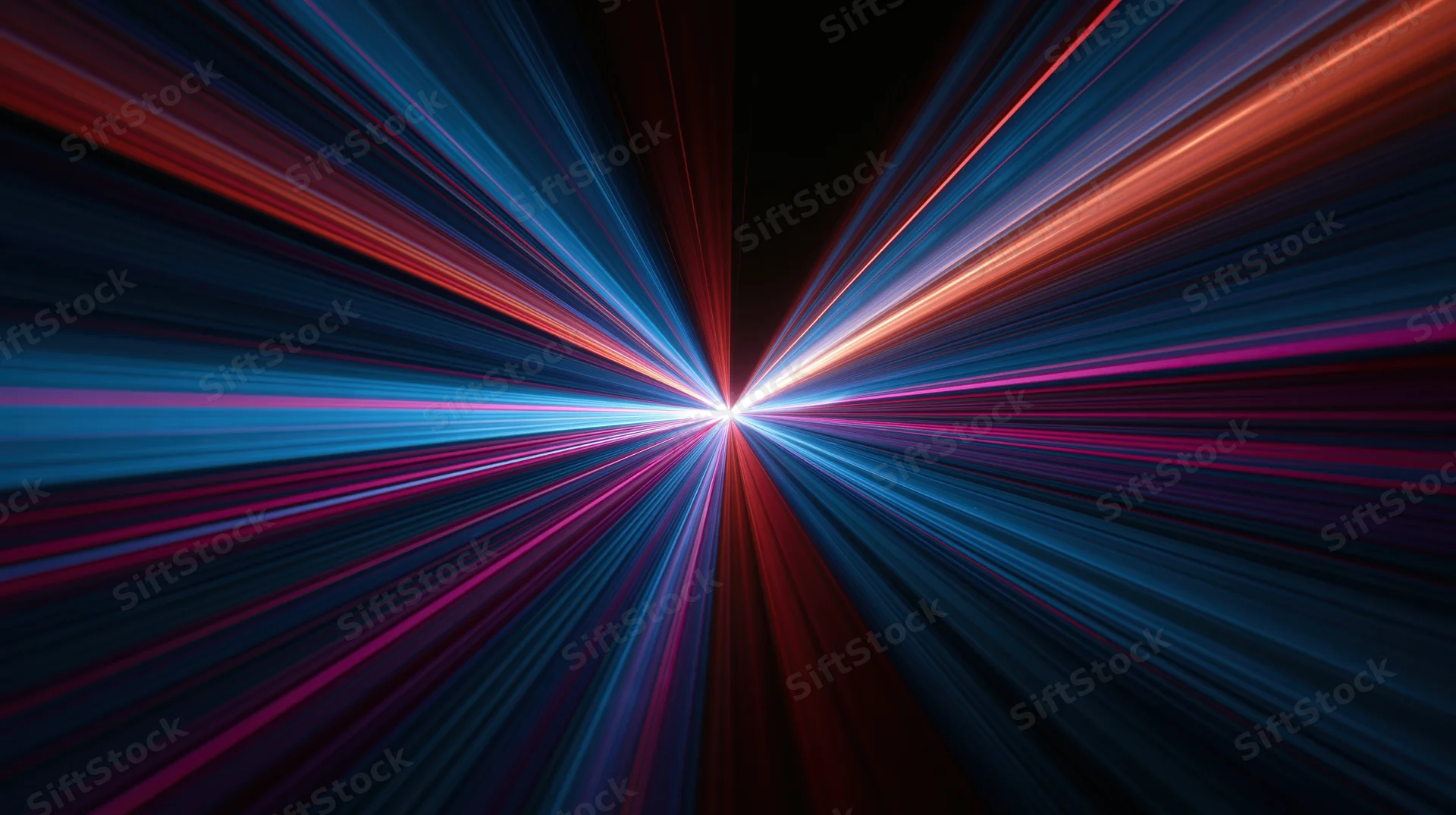 Radiant light burst with colorful rays converging at center against dark background