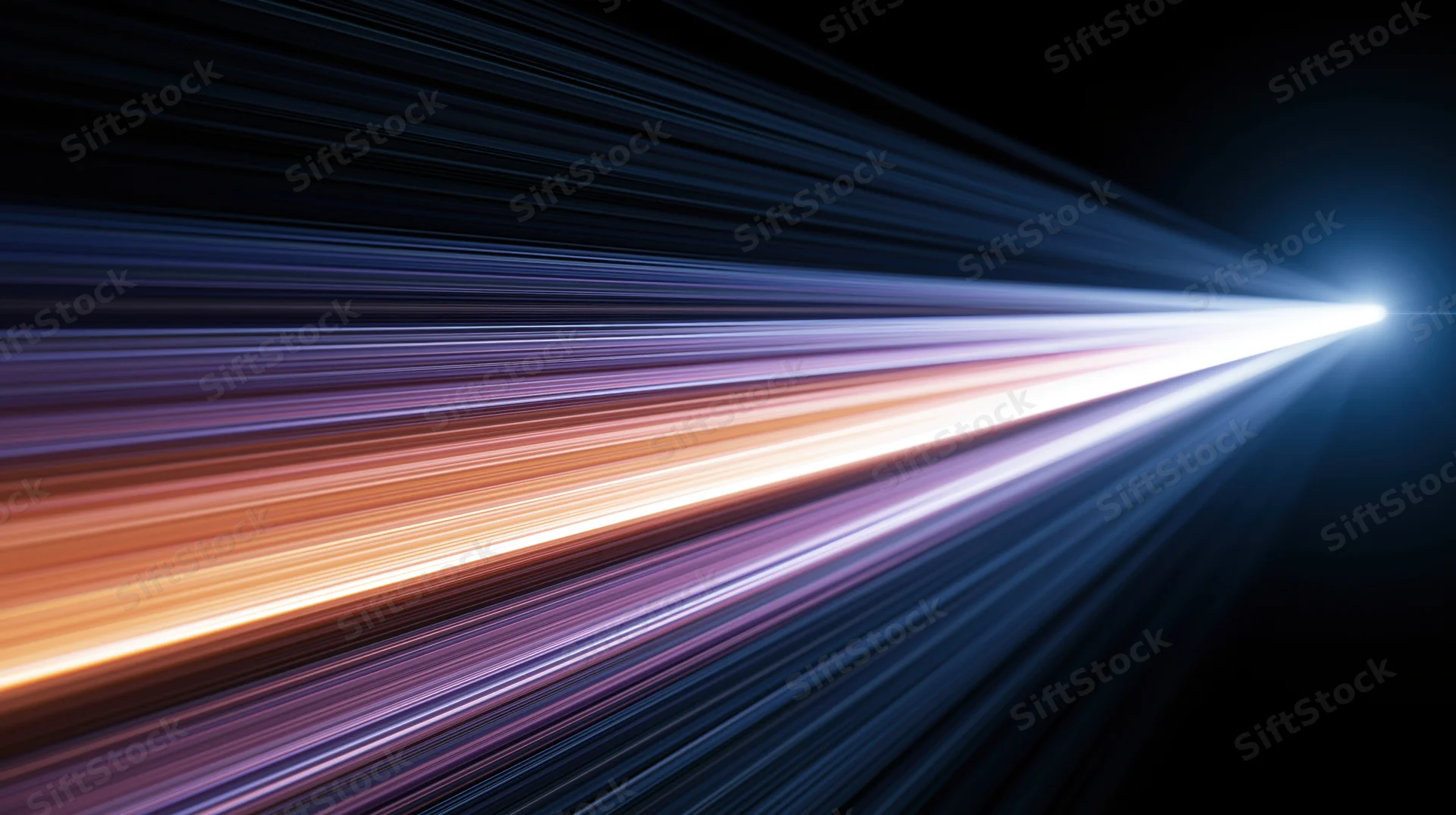 A bright light beam streaking across dark space with colorful motion blur trails