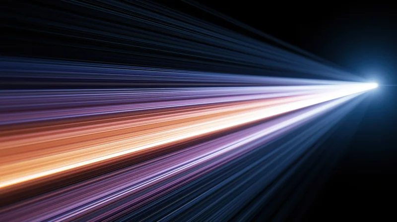 A bright light beam streaking across dark space with colorful motion blur trails
