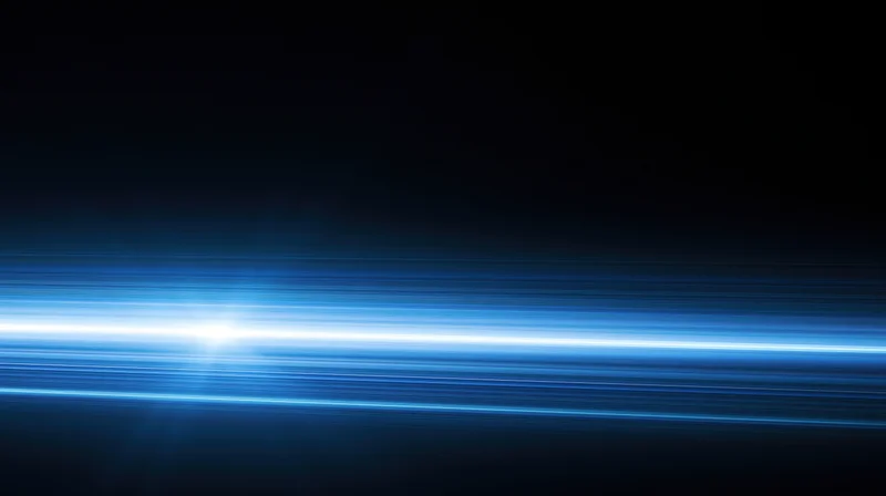 Horizontal blue light streaks moving across dark background with glowing center and motion blur