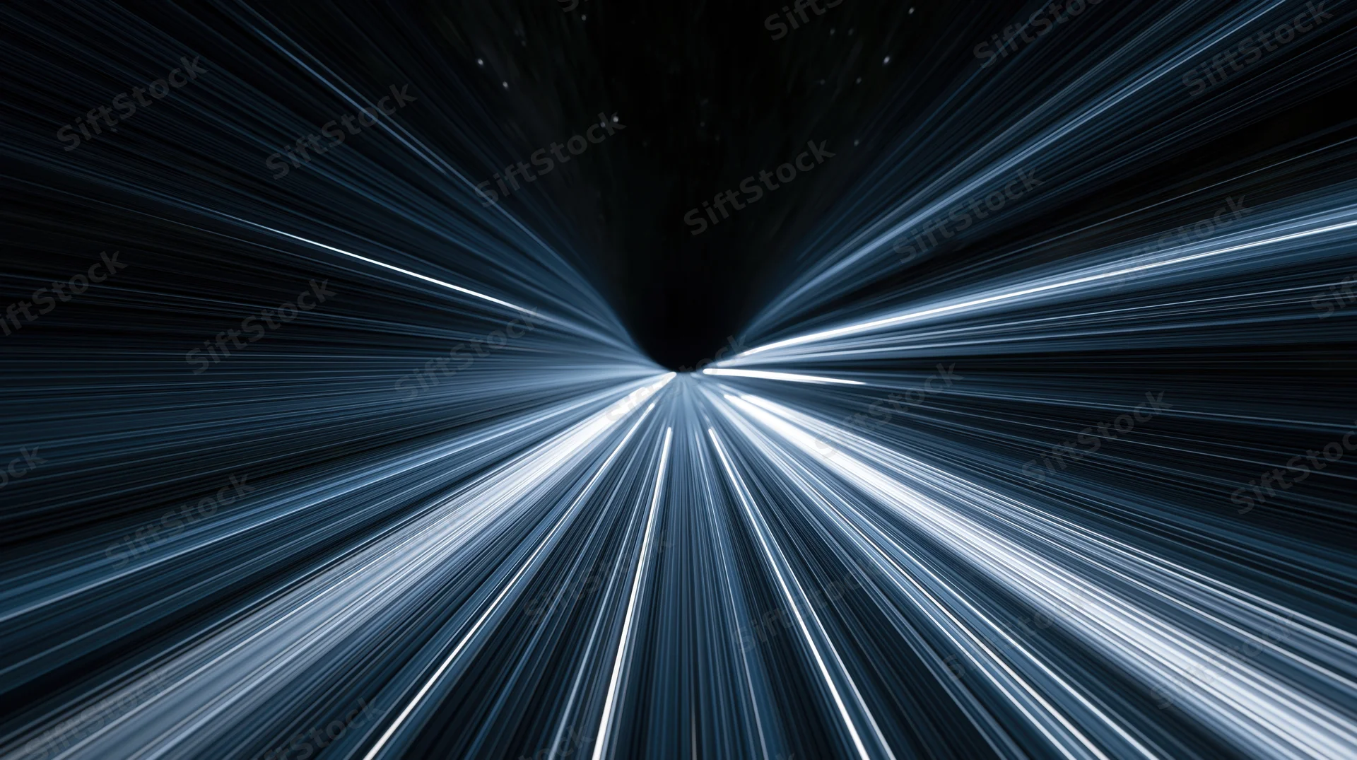 Light streaks converging in a dark tunnel simulating high-speed space travel