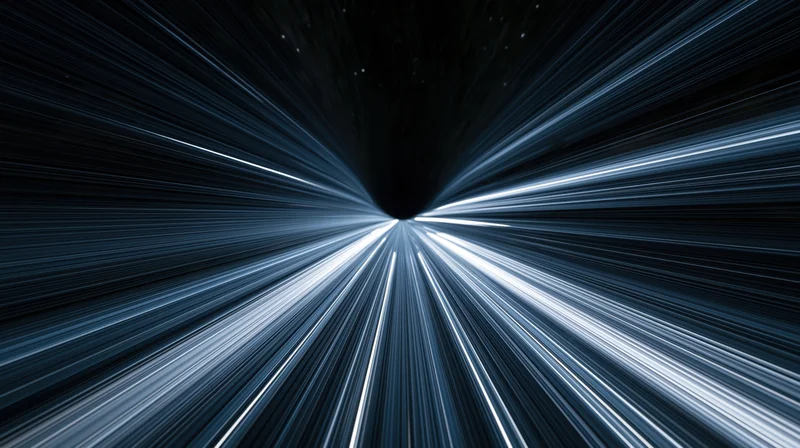 Light streaks converging in a dark tunnel simulating high-speed space travel