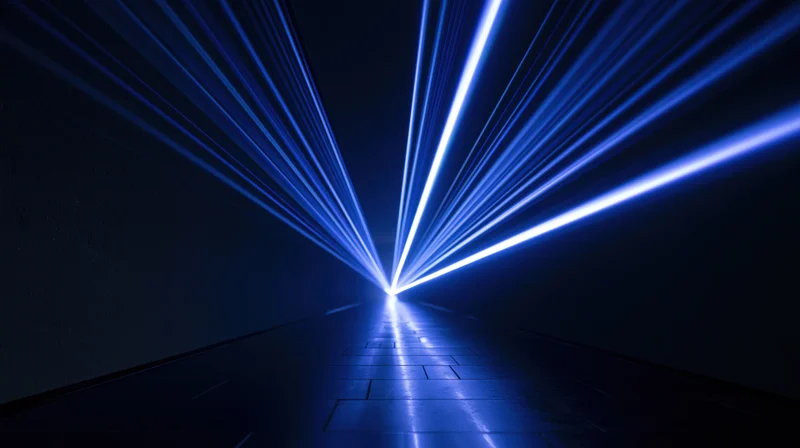 Blue neon light beams converging in a dark futuristic tunnel corridor