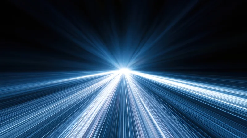 Radiant blue light beams converging at center in abstract tunnel perspective