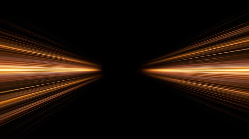 Golden light streaks converging in a dark tunnel creating a sense of high-speed motion